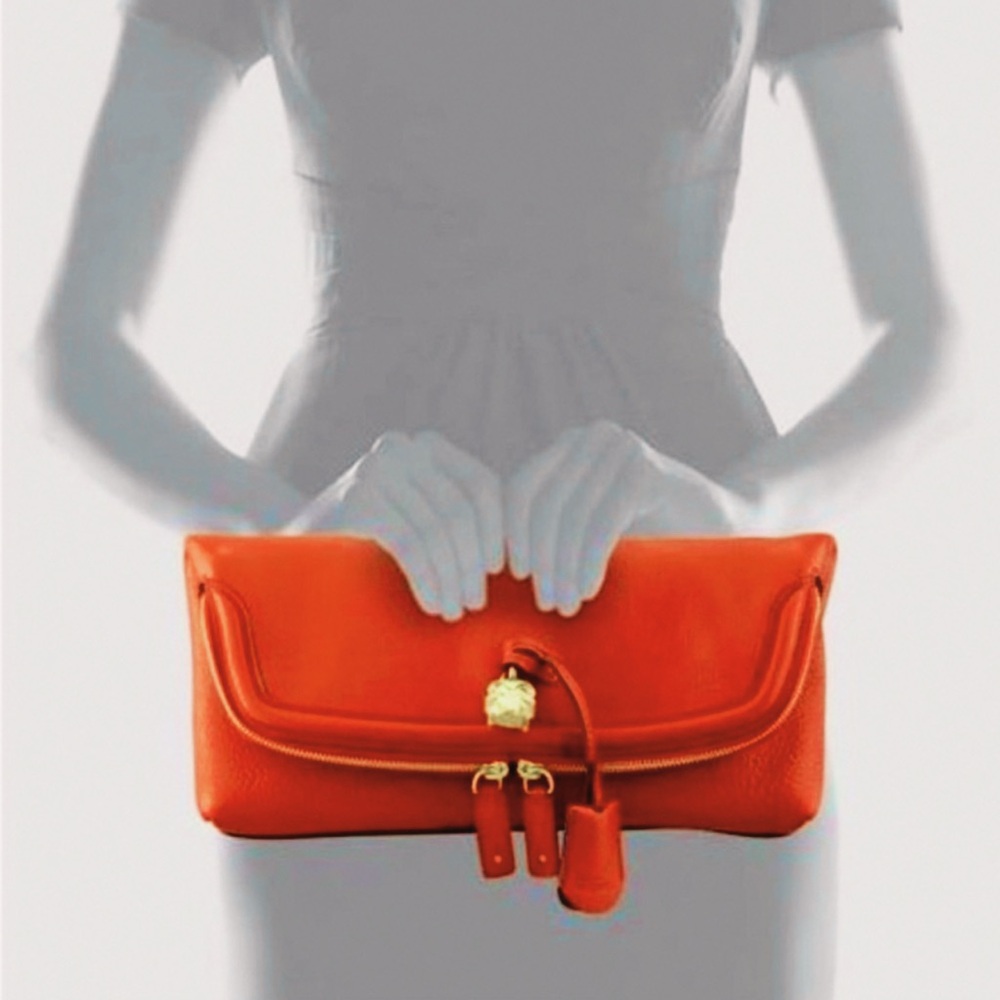 Alexander McQueen Authentic Orange Leather Skull
Padlock Fold-Over Clutch Purse